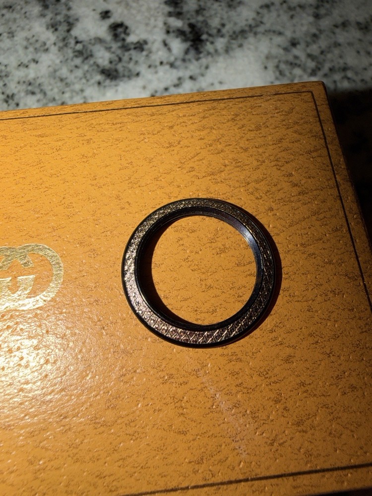 Gucci Black Diamond Cut Bezel