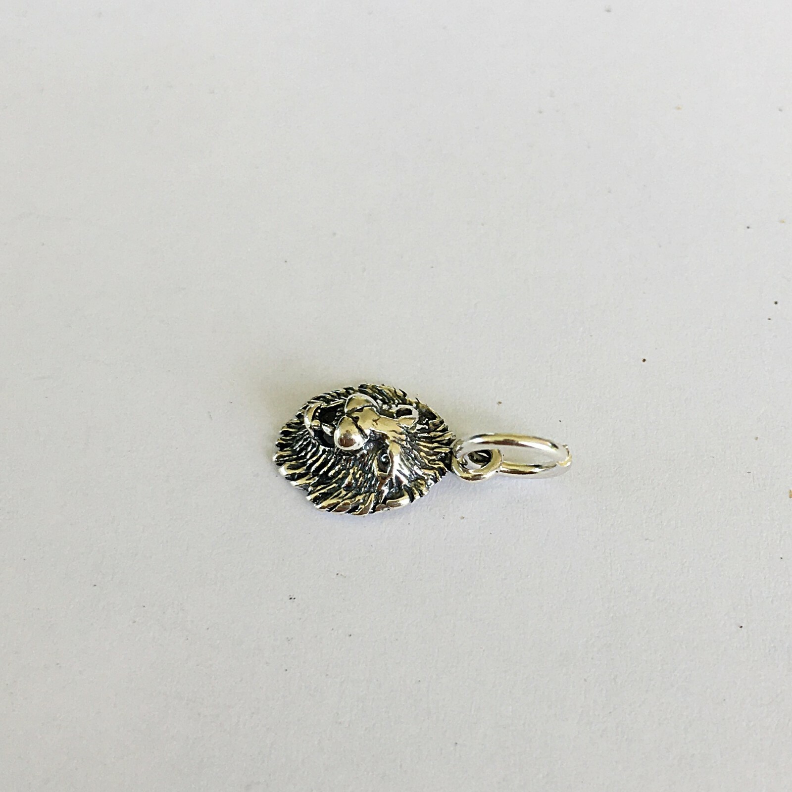 Very small Sterling Silver Lion face mini tiny charm.