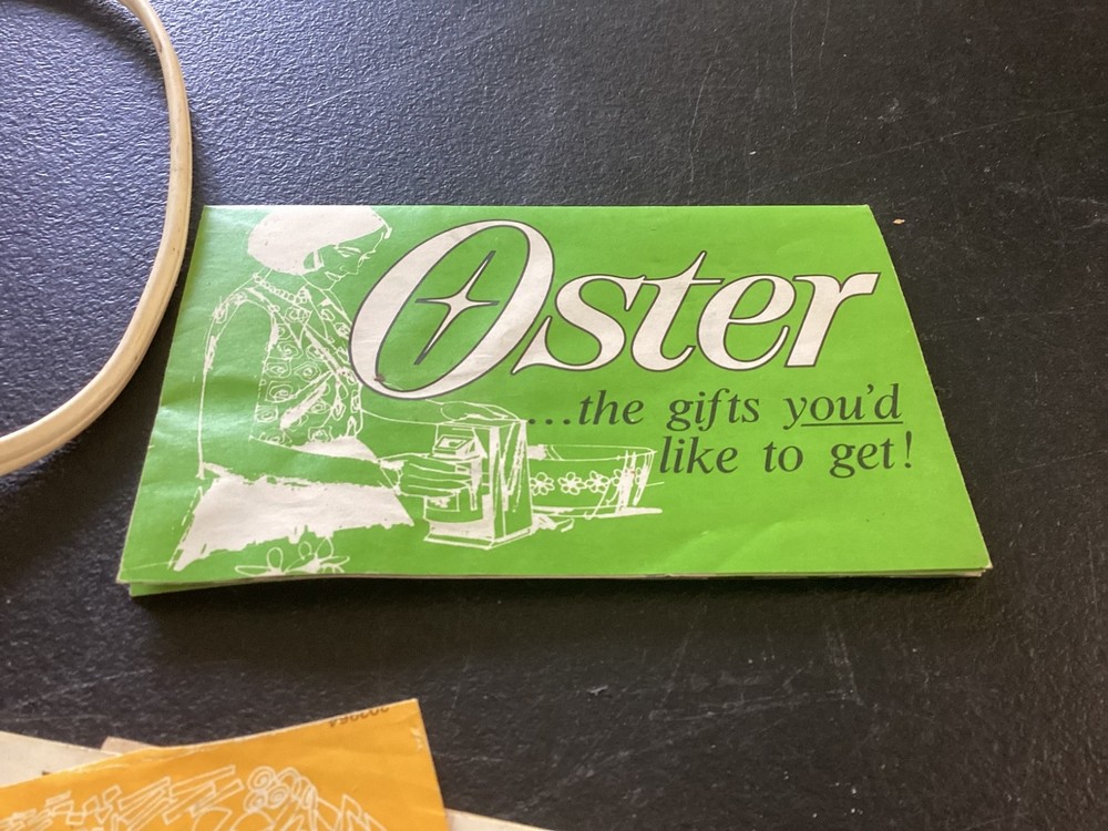 Oster Food Grinder Model 480 E, with attachments, and original paperwork