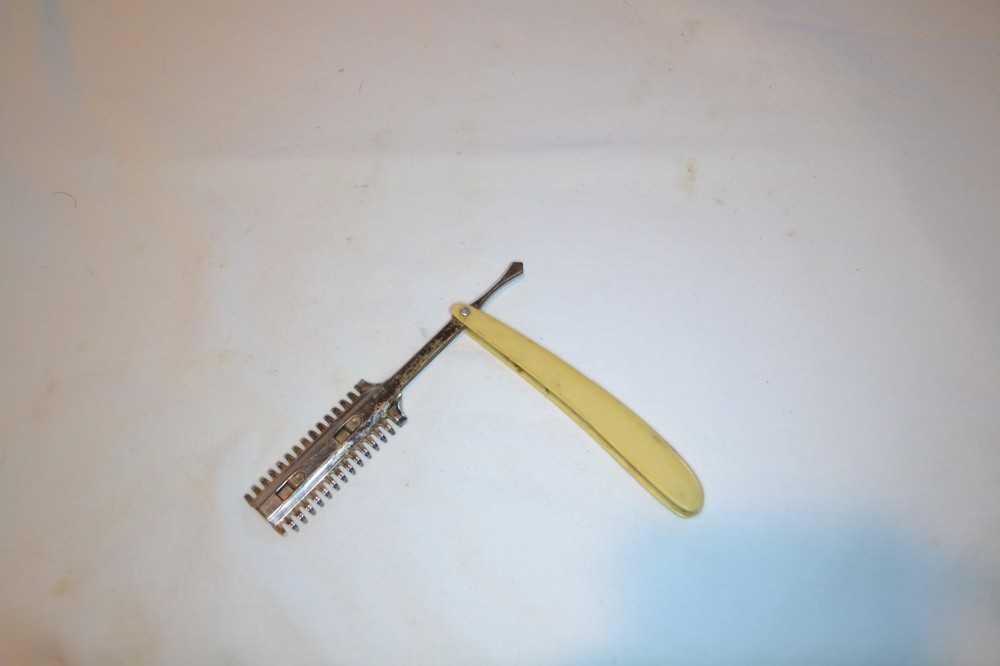 STRAIGHT RAZOR  DURHAM DUPLEX WITH CELLULOID HANDLE