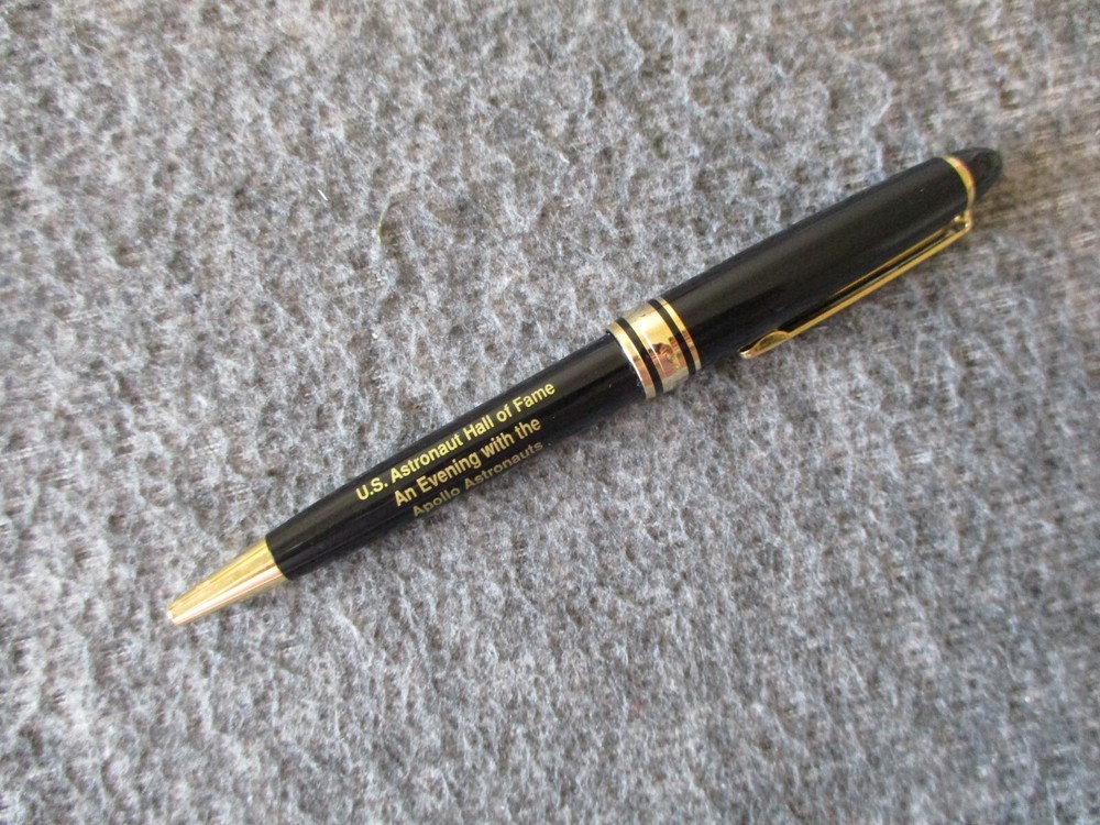 NASA APOLLO ASTRONAUT INDUCTION PROGRAM SIGNED BY WALTER M. SCHIRRA + PEN