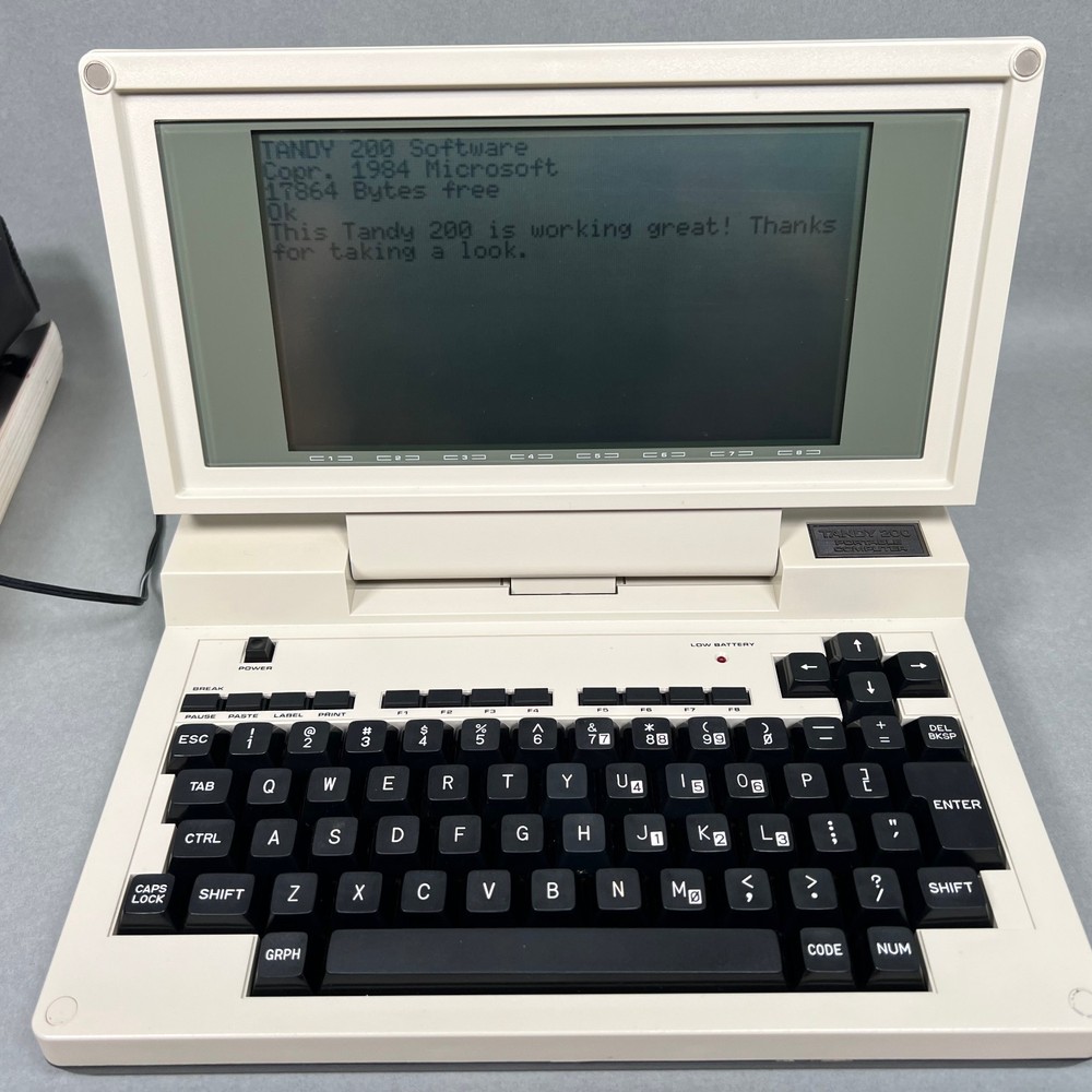 Tandy 200 Portable Computer, Power Adapter, Case, Book, Owner's Manuals WORKING