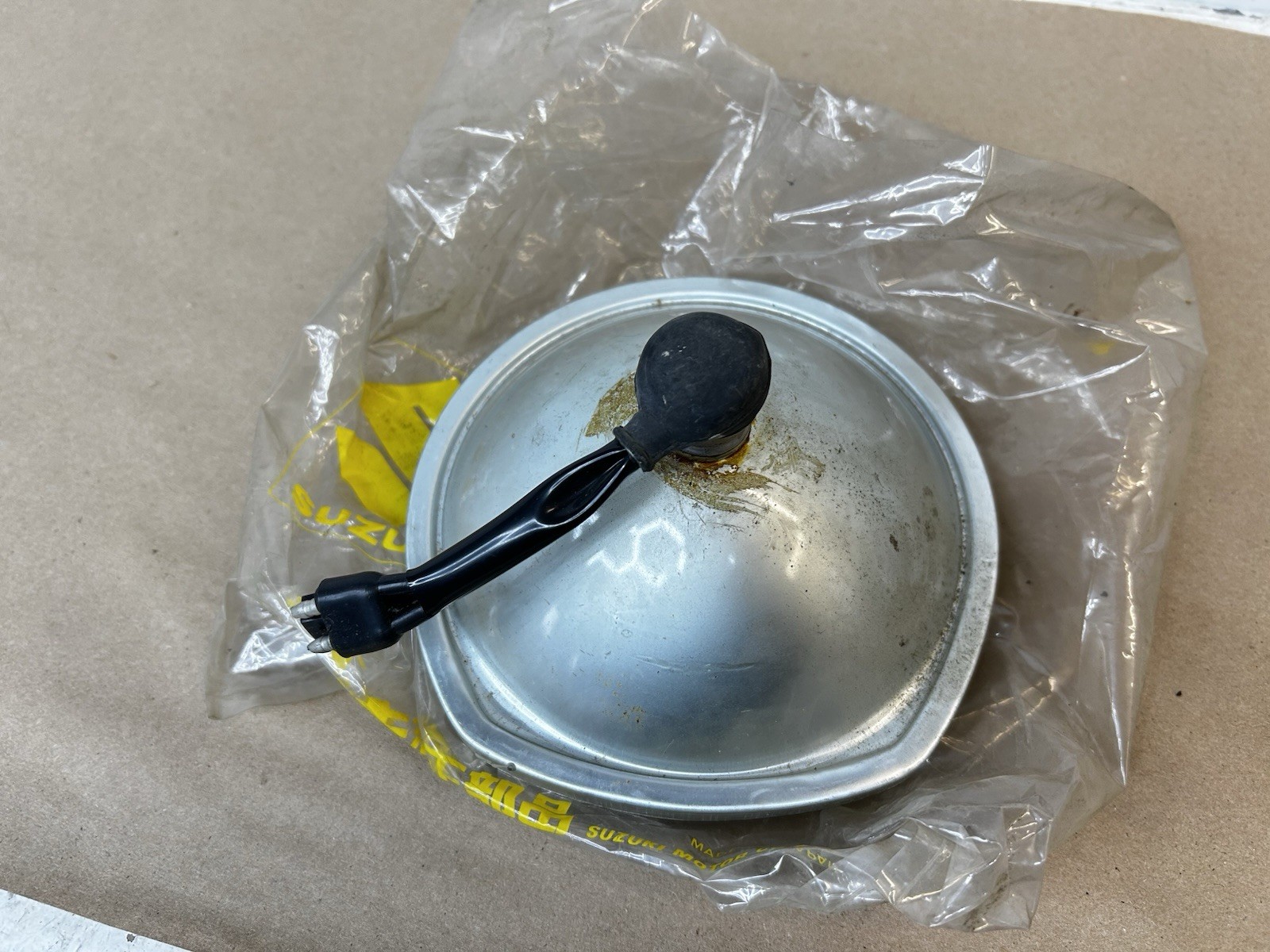 1972 Suzuki TS 400 New Old Stock 12V Headlight 35121-18610