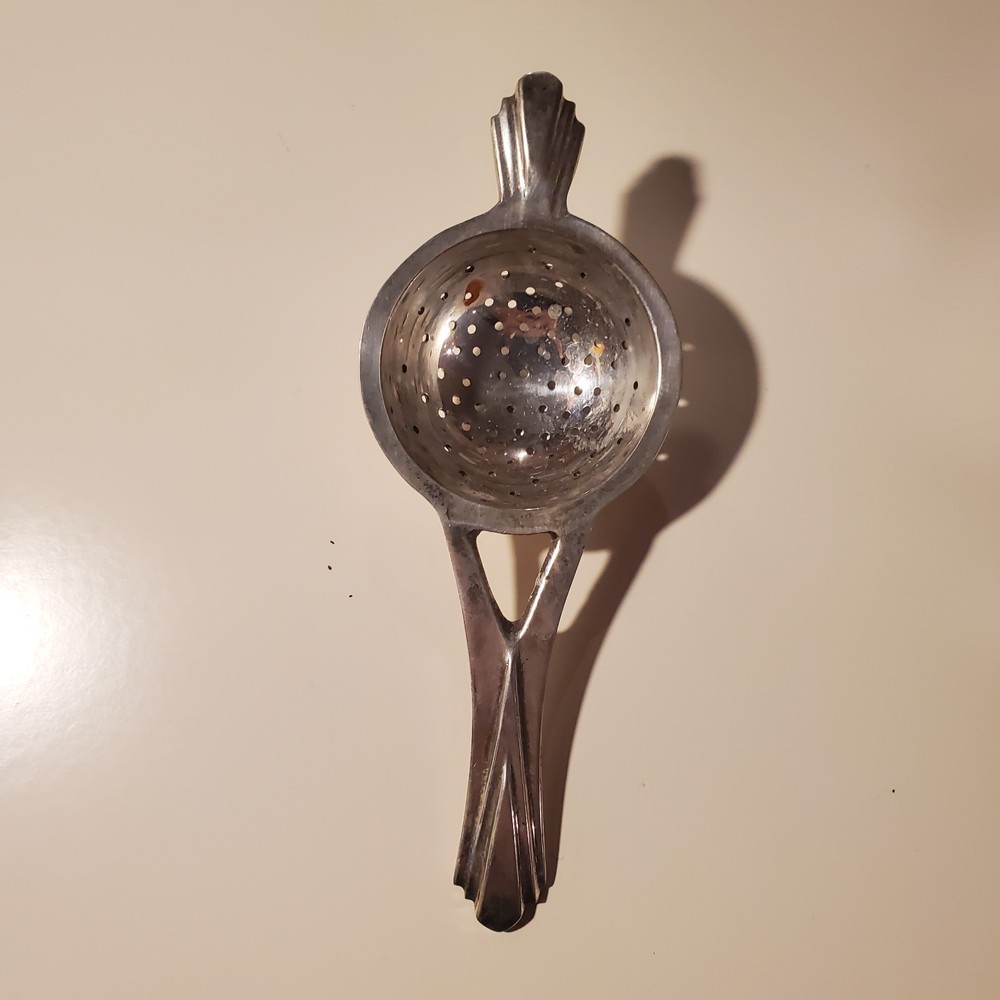 vintage silver plated tea strainer art deco style