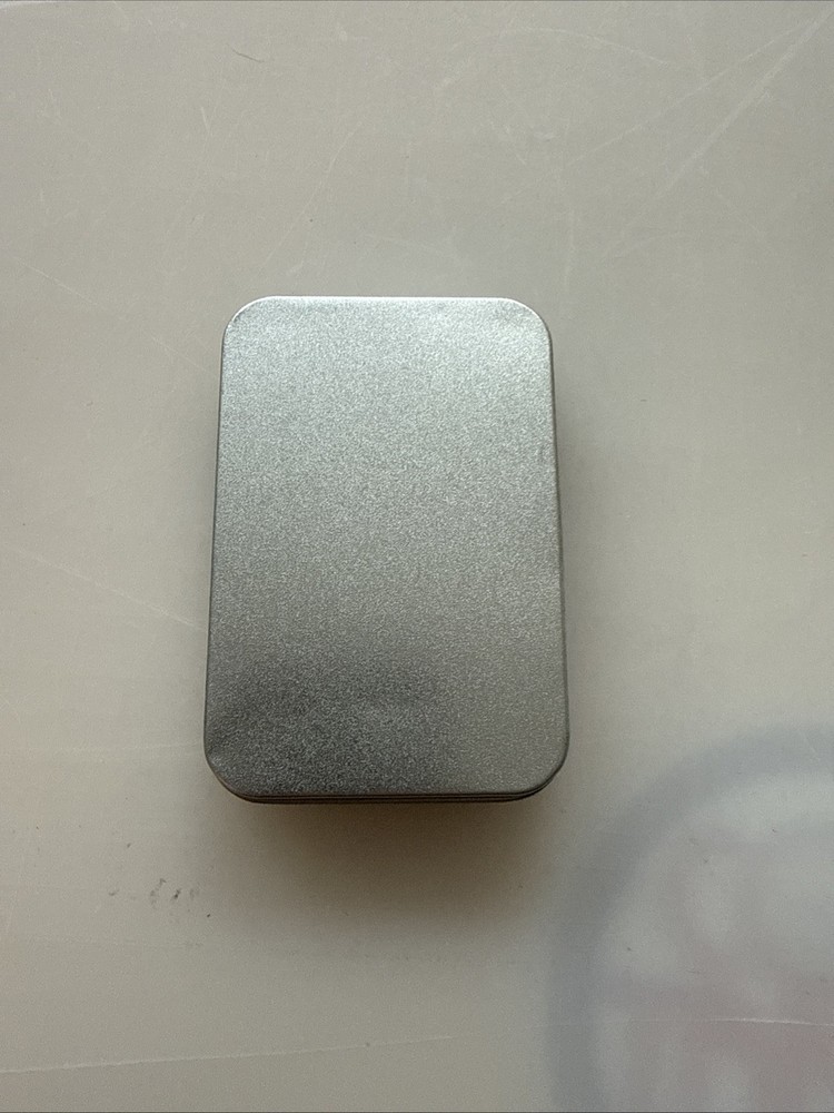 Solid metal construction with metal carrying & display case. Multicolor finish