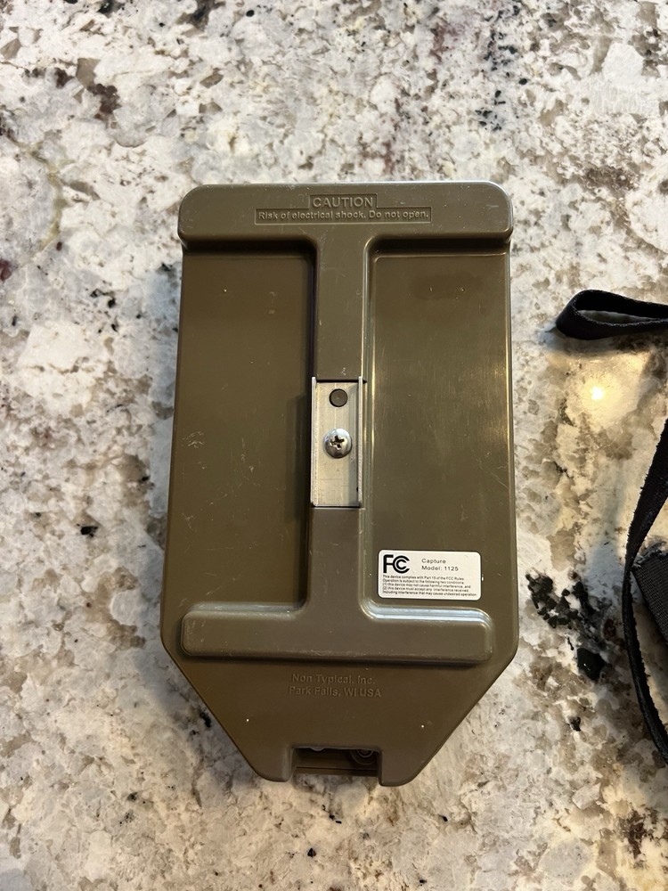 Cuddeback trail camera, specifically a model from the Capture IR series