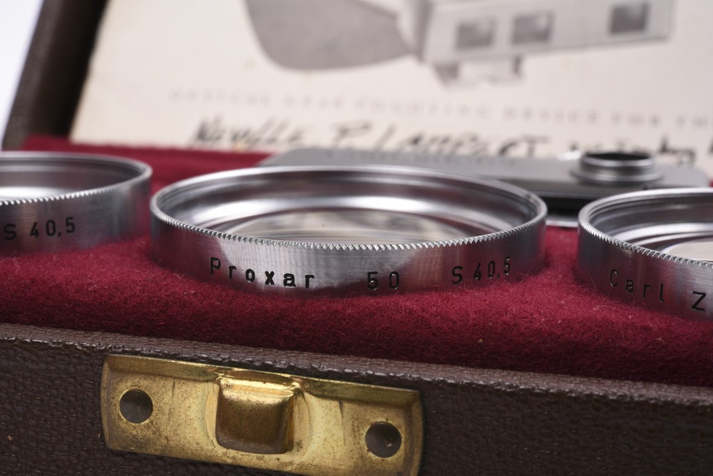 Contax counter with original case and instruction manual.