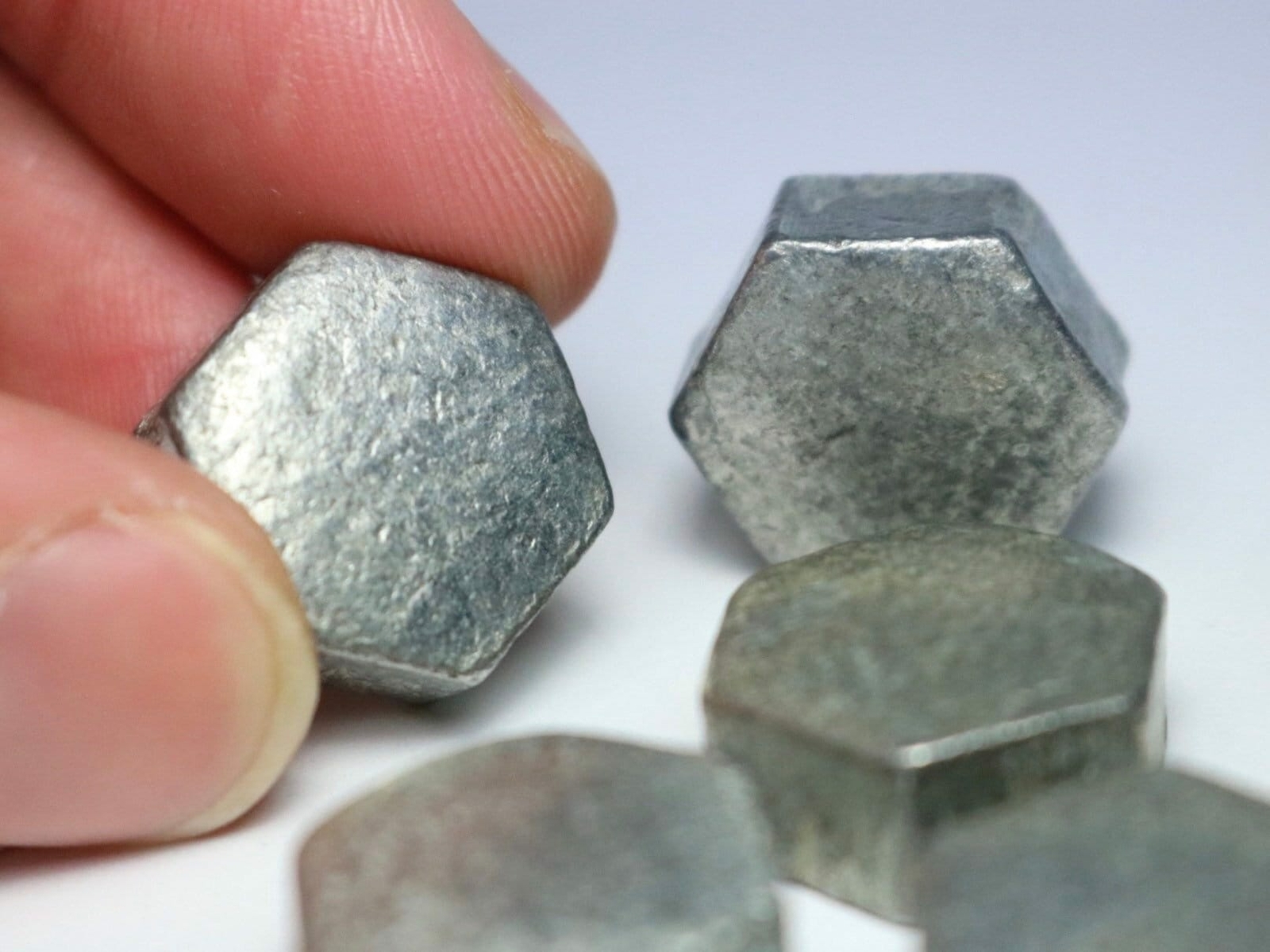 Five zinc metal hexagons 99.99% element 30 zn chemistry sample bulk