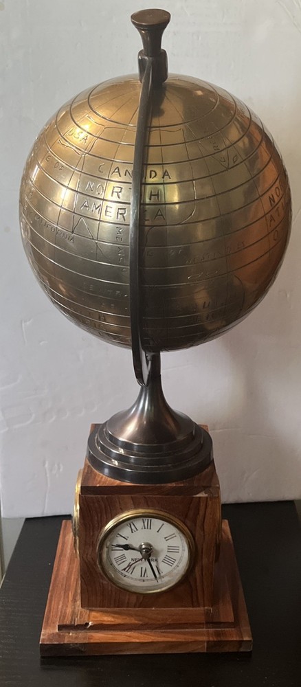 Bains Kushnick Clock Globe