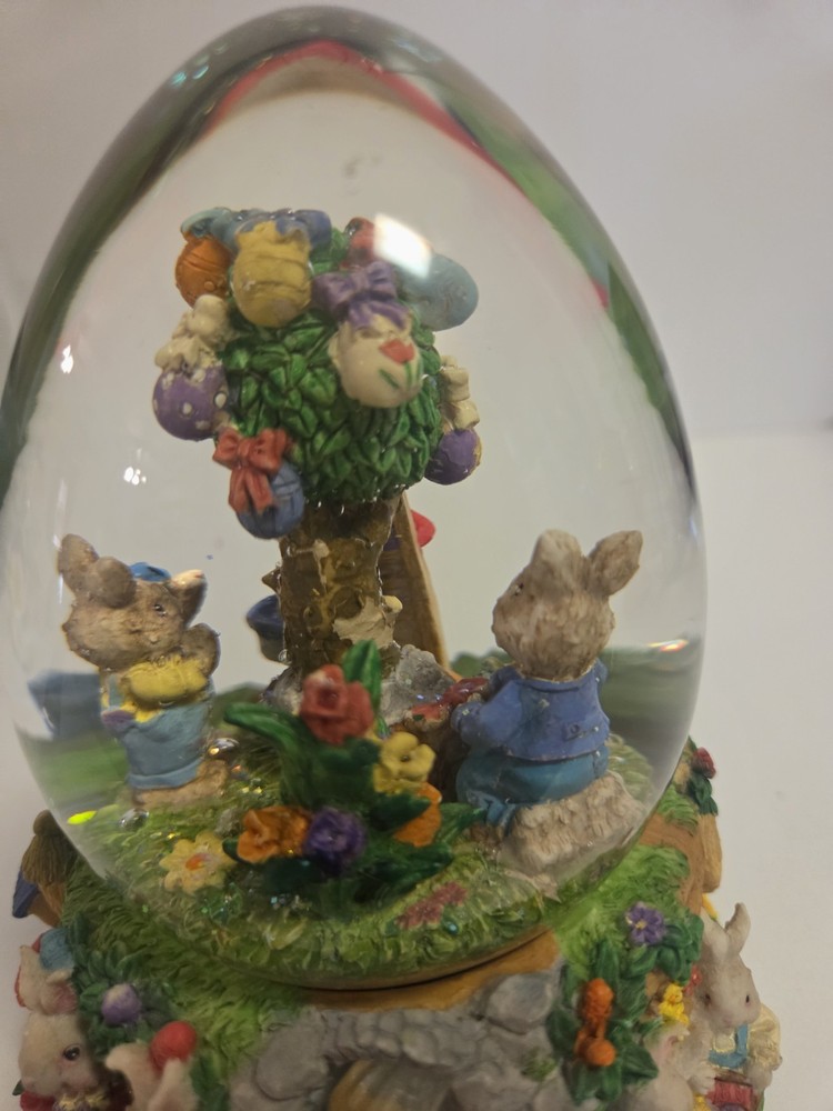 Springtime/Easter musical egg shaped glitter globe plays "Easter Parade"