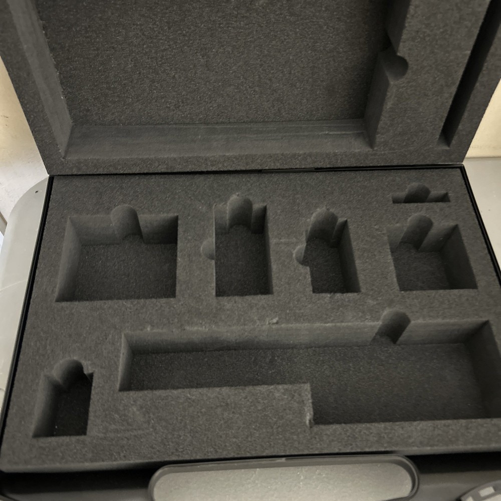 Plastic portable storage or tool box with red snap locks