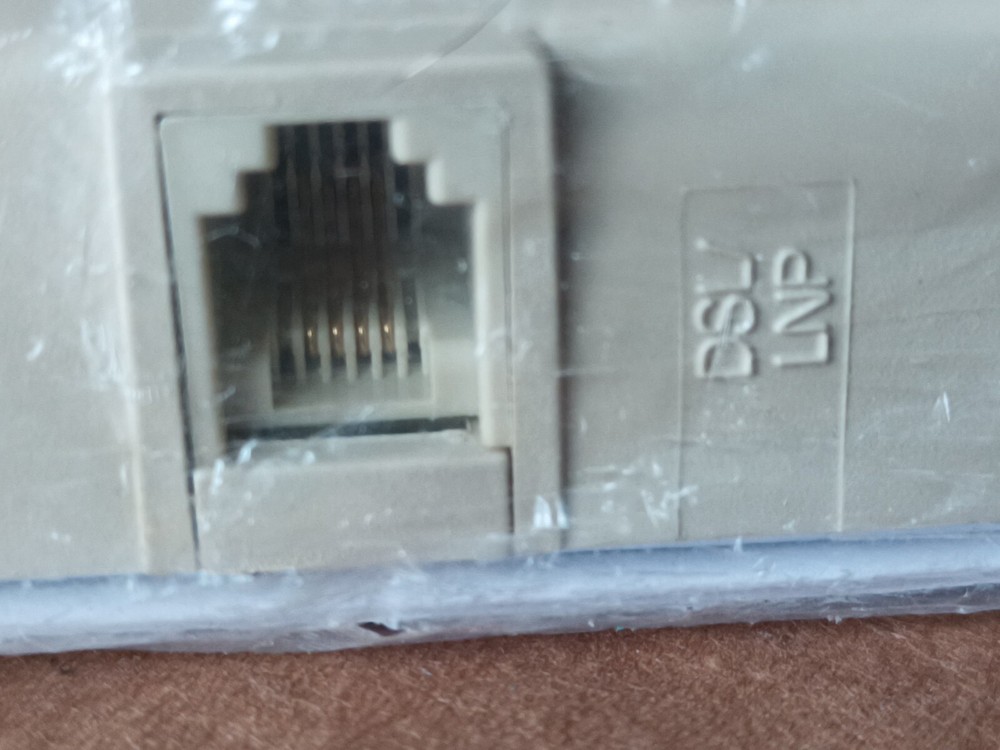 Corning Tool less Wall-mount Distributed DSL Microfilter/Phone Outlet