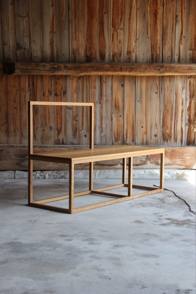 Minimal, solid White Oak Bench by Richard Ostell. Floor Sample.. H.32” L48” D18”