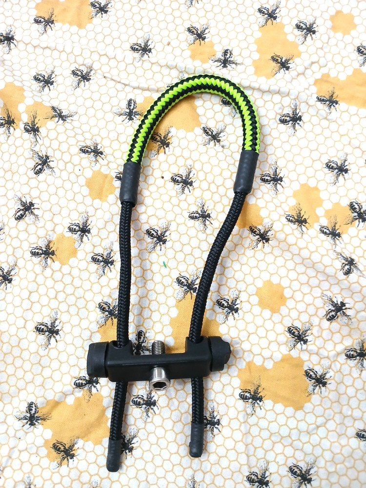 Blackout wrist sling with screw