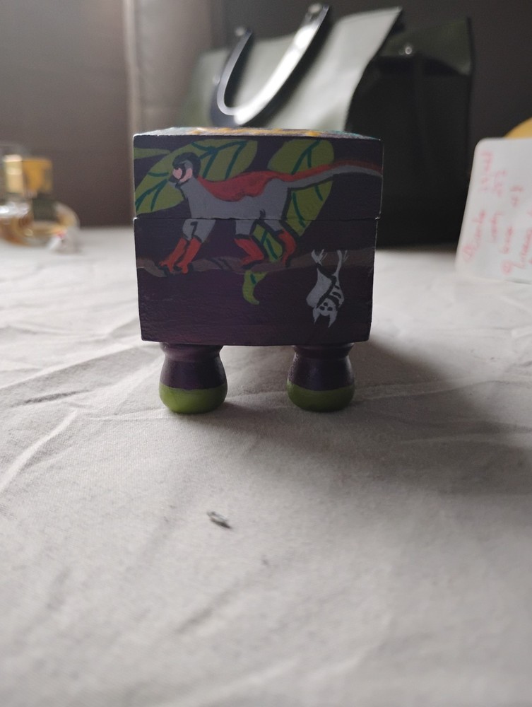 small painted box with tiger, elephant, zebra, lion, monkey