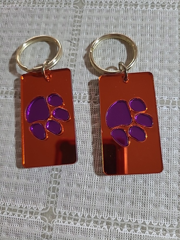 TWO TIGER KEY CHAINS WITH MIRROR ON THE BACK