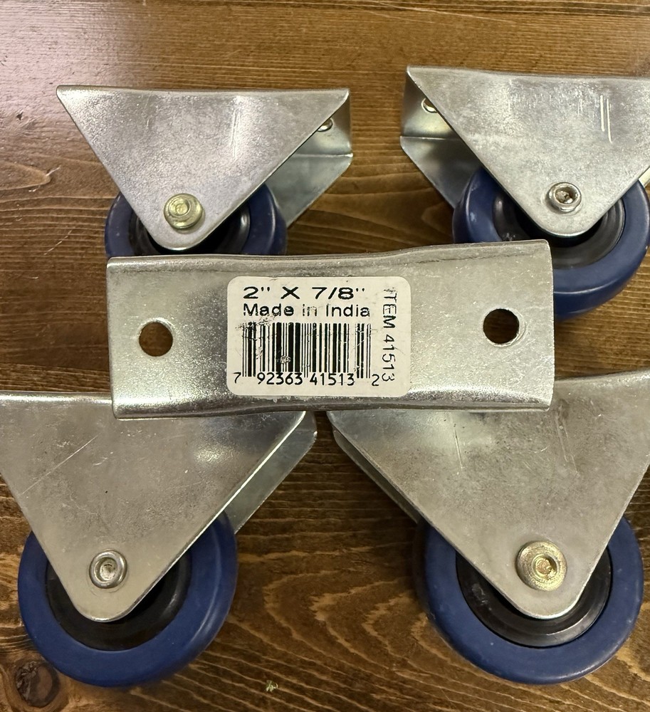 8- 2 7/8 Fixed Blue Casters Pre-owned