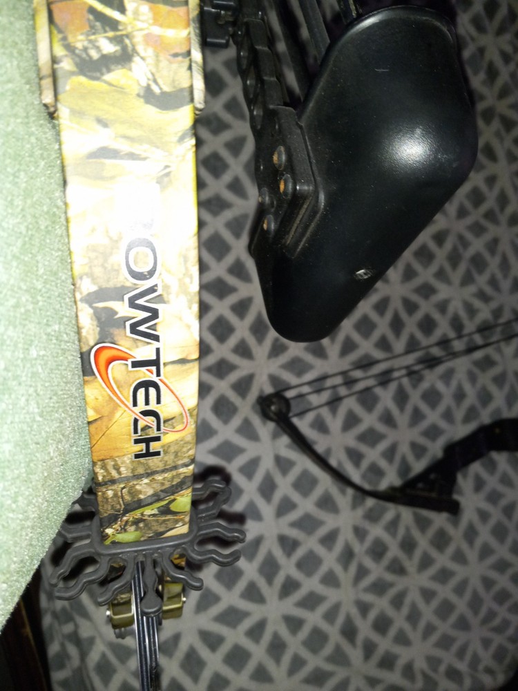 tomkat bowtech compound bow with aftermarket scope