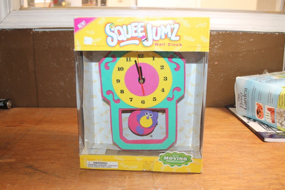 Vintage 1998 SqueeJumz Wall Clock With Moving Characters Pendulum Multi Color