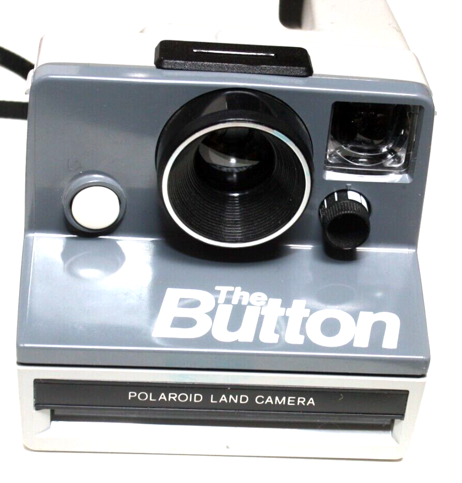 POLAROID CAMERA-THE BUTTON-TESTED-WITH STRAP