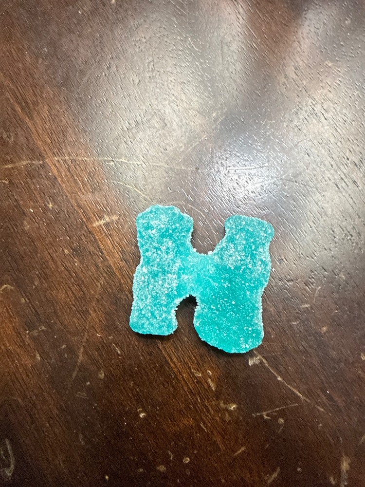 sour patch kids holding hands