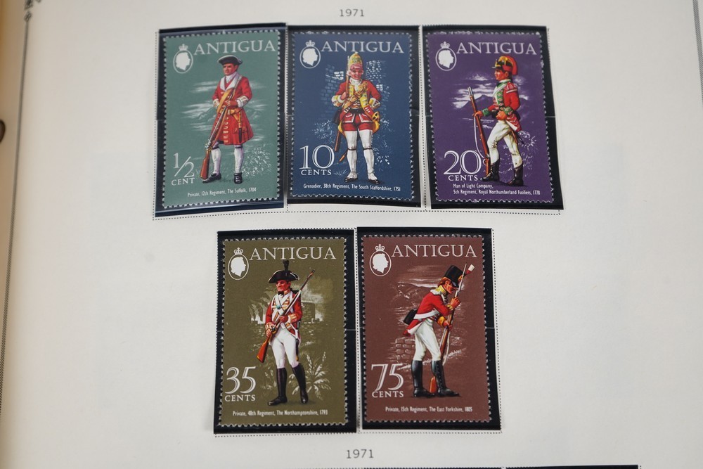 WORLDWIDE A-L 1970s COLLECTION OF 875+ STAMPS MINT & USED STORED IN SCOTT ALBUM