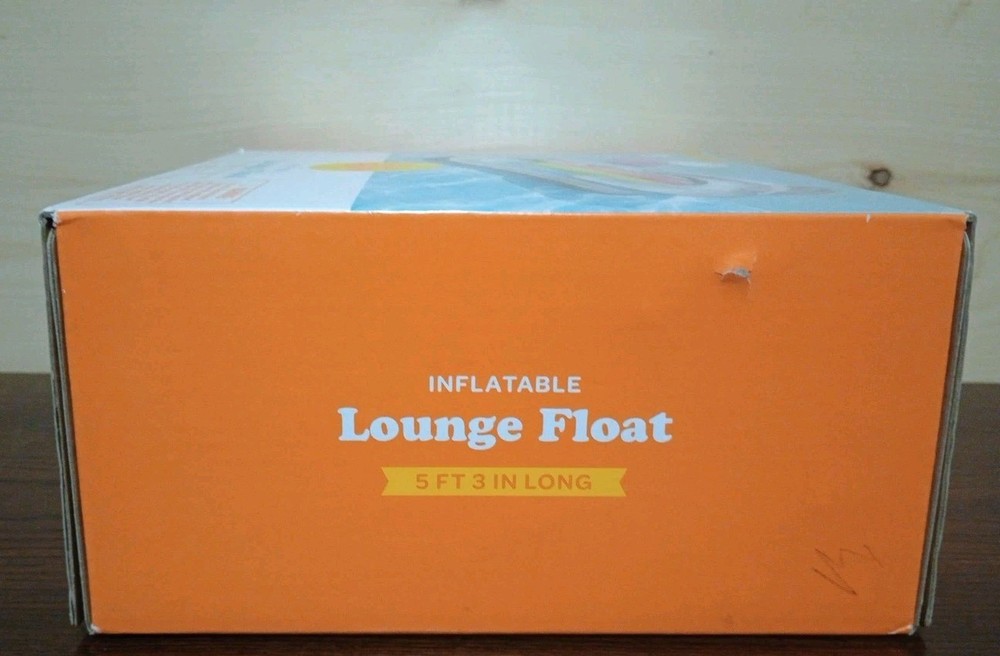Sun Squad Inflatable Lounge Float. Build-in Headrest And Open Seat Bottom.
