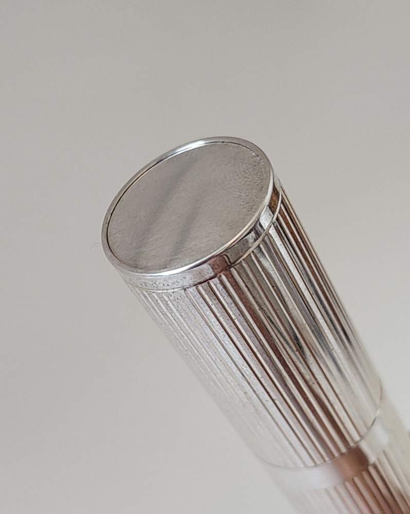 Perfume holder + makeup brush  