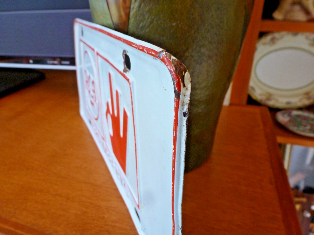 Embossed RCA Zero Defects License Plate from 1964