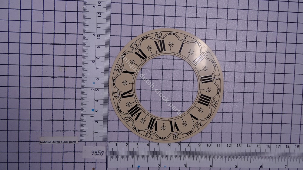 WHITE CLOCK DIAL OR CHAPTER RING  4 5/16" OR 11 CM OUTSIDE DIAMETER.