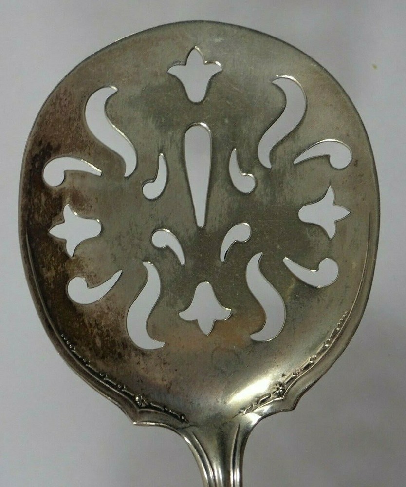 Unmarked Silverplate Pierced Casserole Spoon 9 1/2"