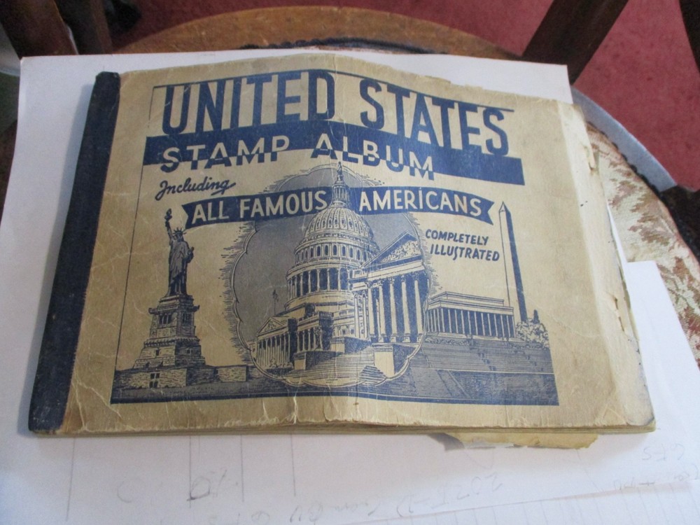 VINTAGE 1943 STAMP ALBUM WITH PARTIAL STAMPS INCLUDED