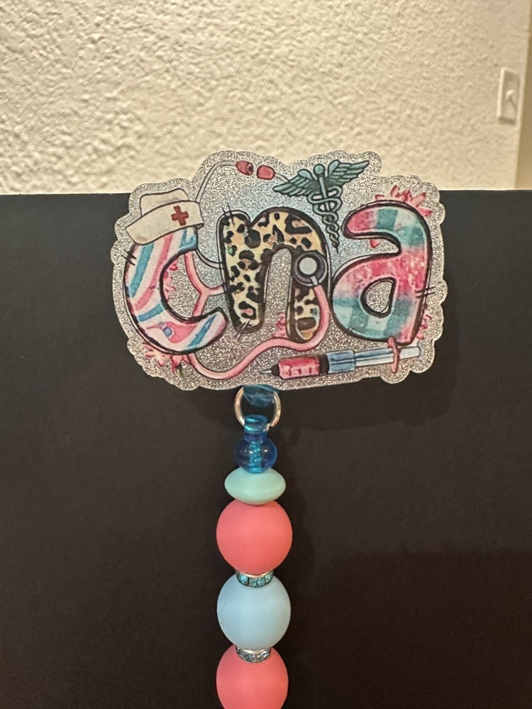 Beaded name badge holder. Retractable. CNA.