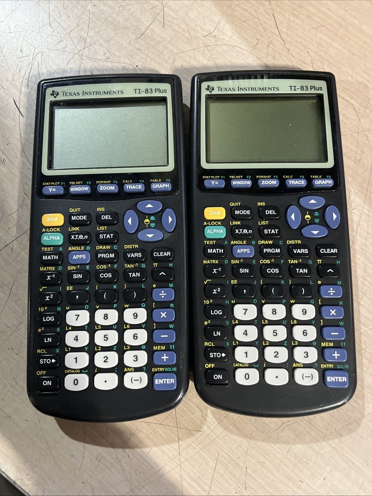 x2 TEXAS INSTRUMENTS TI-83 PLUS GRAPHING CALCULATOR