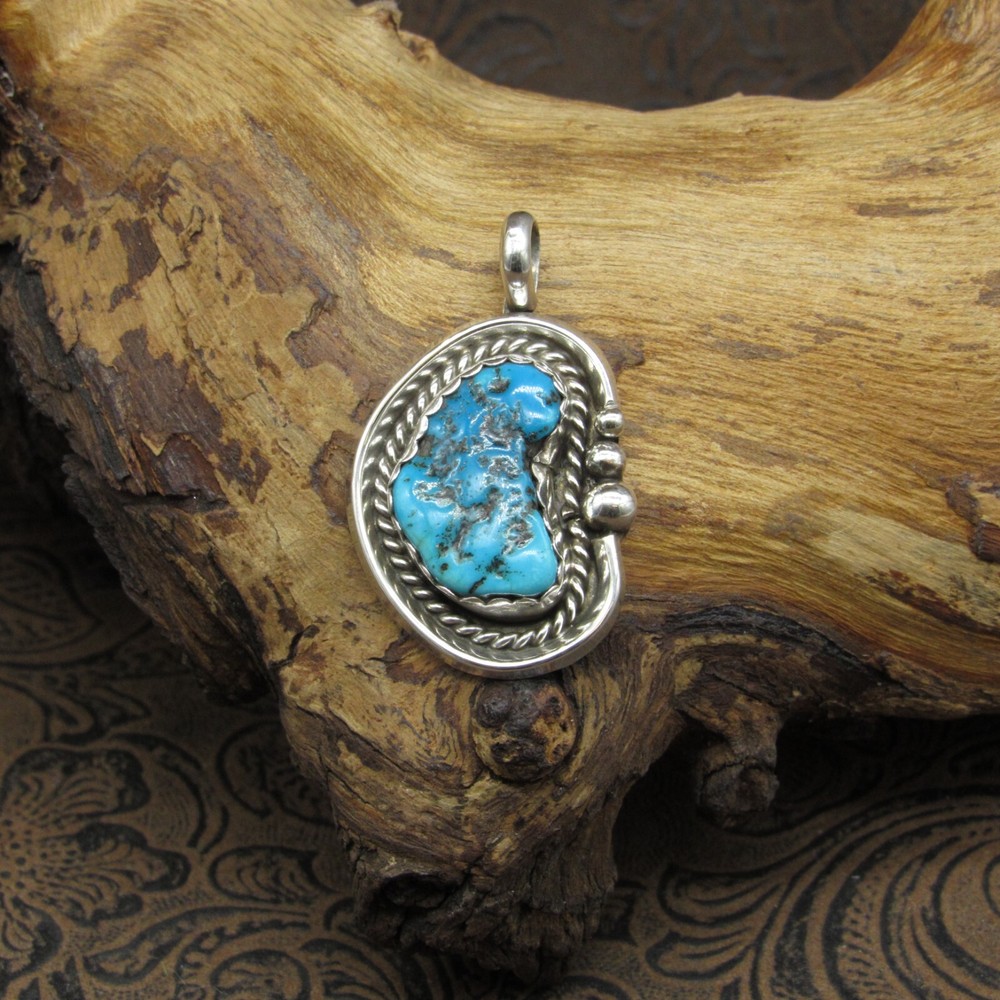*Sterling Silver Oblong Blue Turquoise Pendant With Heavy Matrix