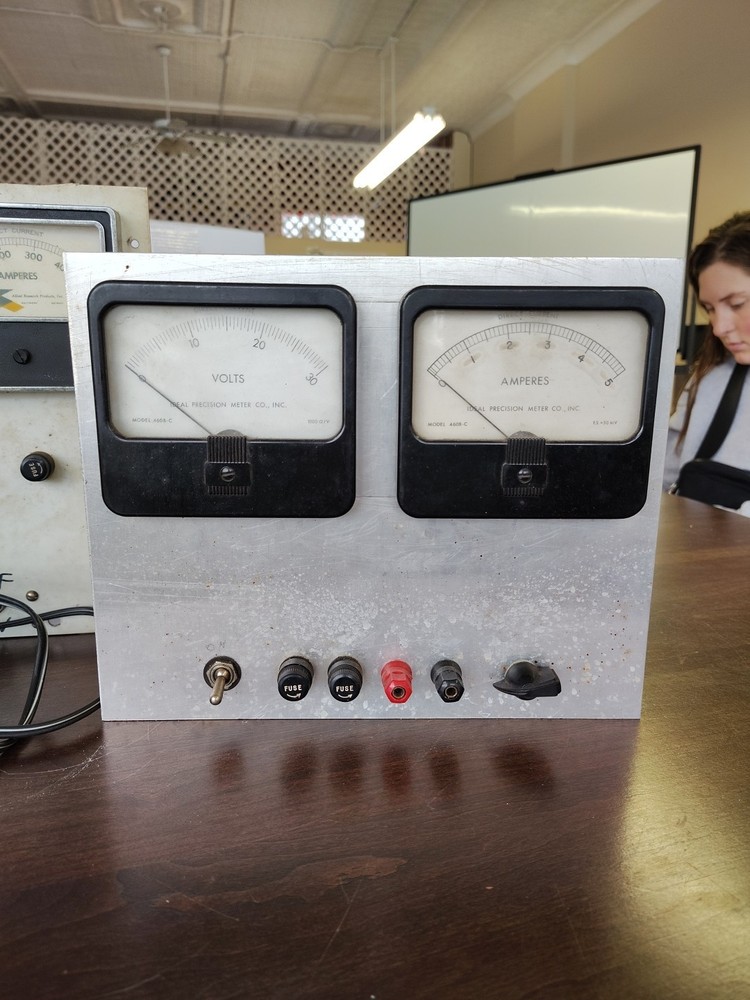custom-built power supply fixture featuring Simpson Model 59 panel meters.