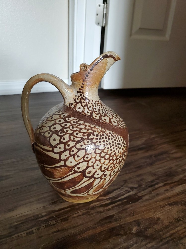 Amazing Pottery Pitcher Signed SF