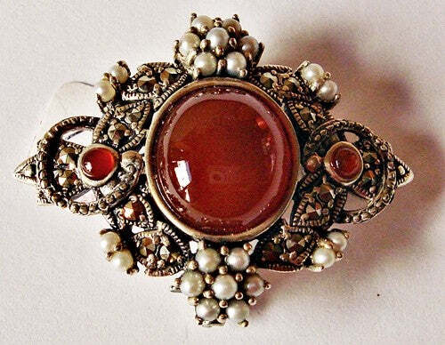 delicate brooch