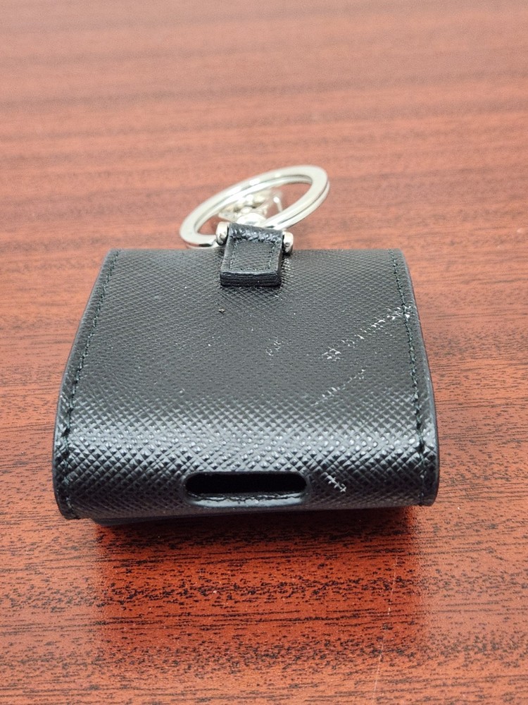 PRADA AirPods case, with triangular logo and Saffiano leather