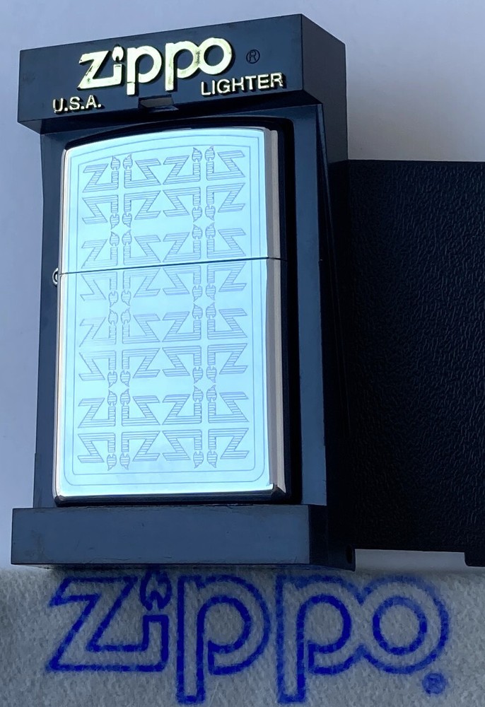 ZIPPO PREVIOUSLY COLLECTED Not Used Zi Lighter FLAME Repeat  2004 Reverse