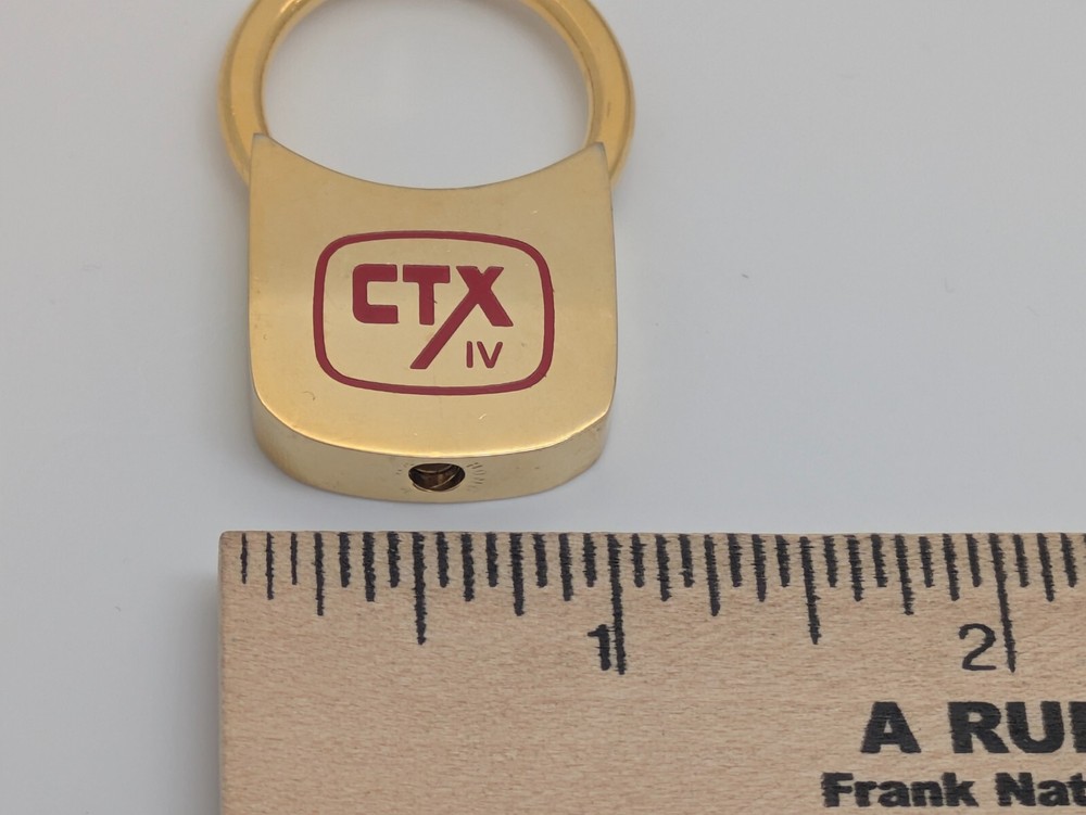 CTX IV Metallic Gold Toned Keyring
