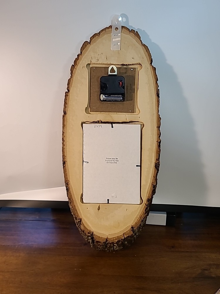 Vintage Laquered Wood Tree Slice Buffalo Clock. Clock Does Not Work.