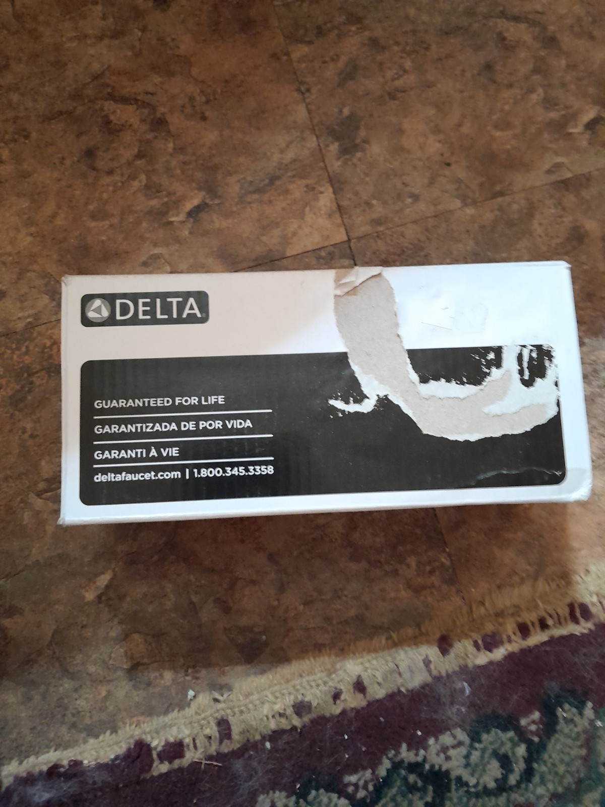 Delta 75950-SS Trinsic Single Bar Tissue Holder Champagne Bronze