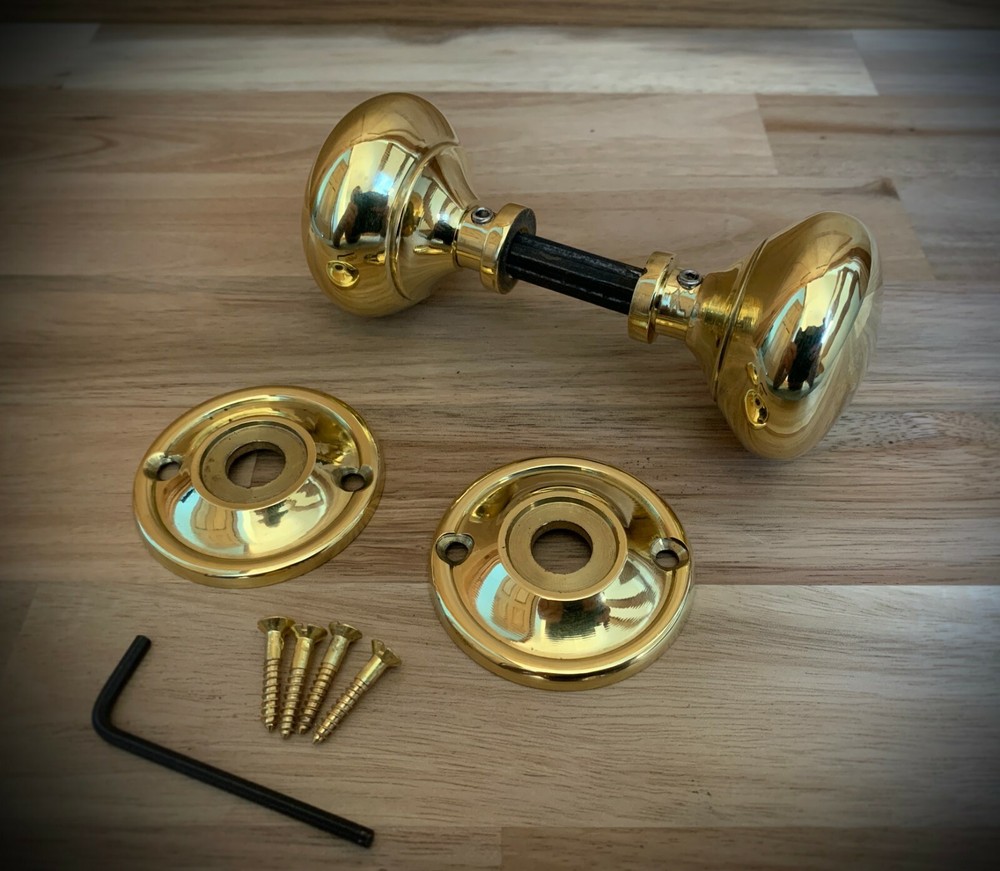 A pair of Solid Brass 65mm Unlaquered Victorian Brass Door Knobs Internal Handle