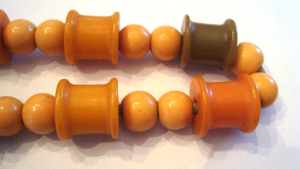 Vintage Bakelite Thread Spools and Bakelite Beads