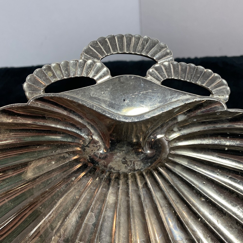 Scallopped edge silver colored dish