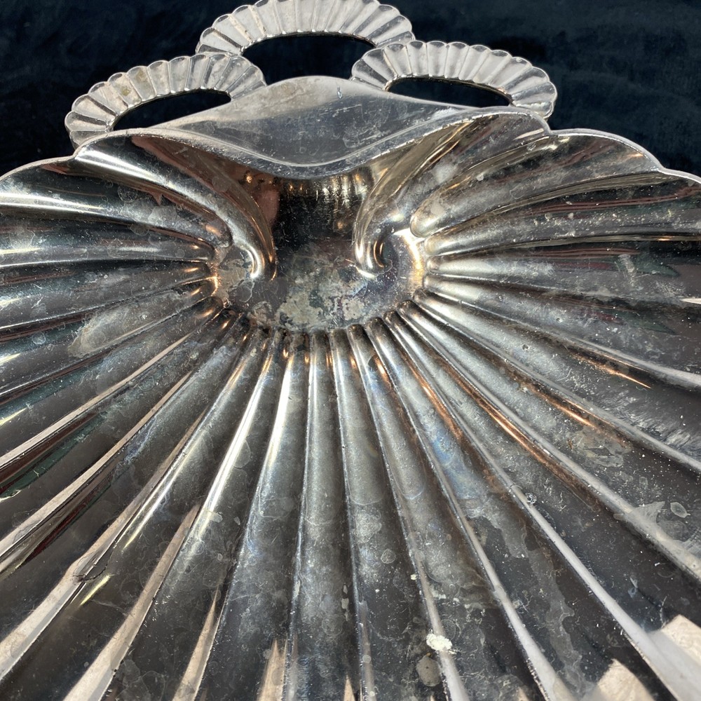 Scallopped edge silver colored dish