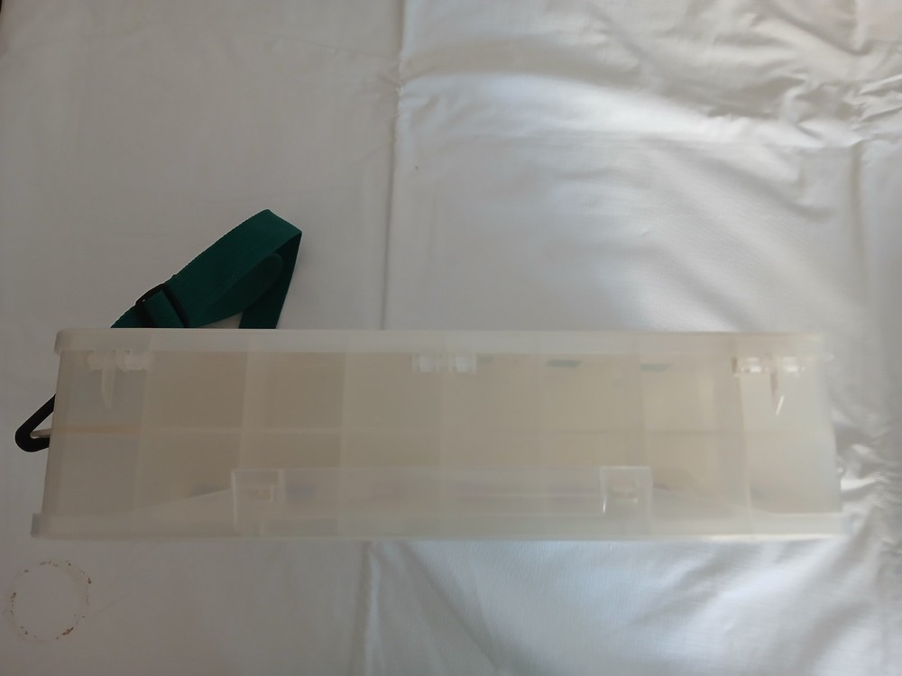 Machine embroidery thread case with cutters and thread holes