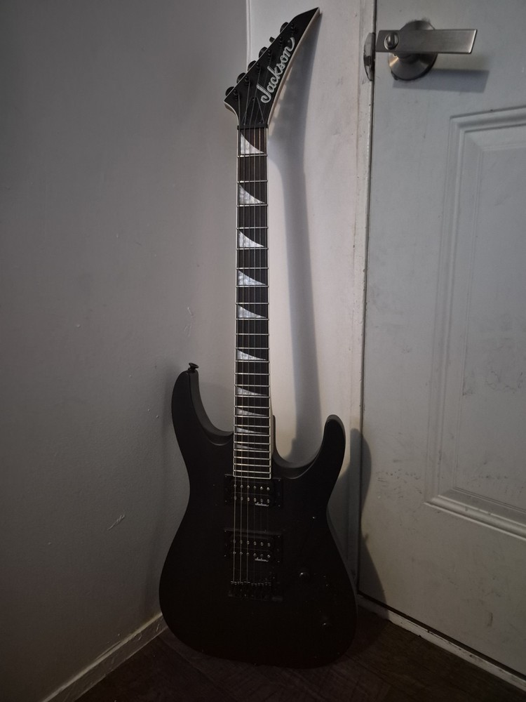 Jackson Black Solid Body Electric Guitar 6 String Right-Handed