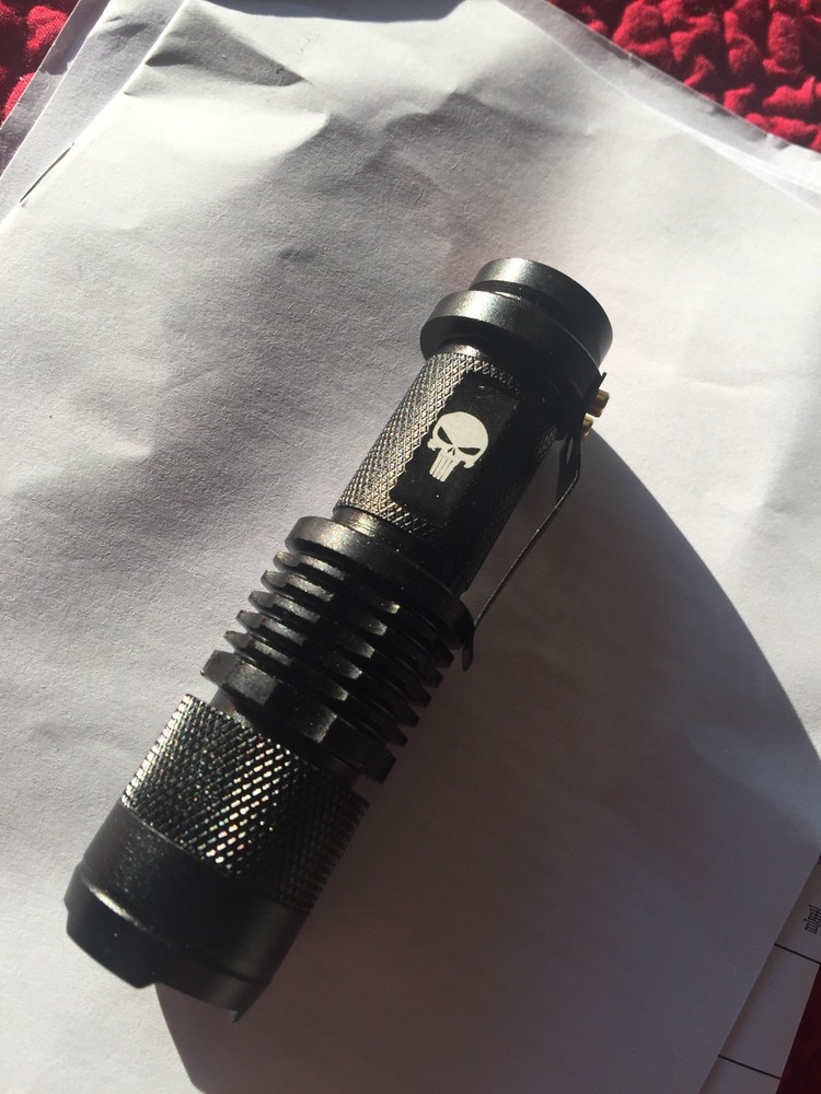 tactical flashlight w/skull logo 